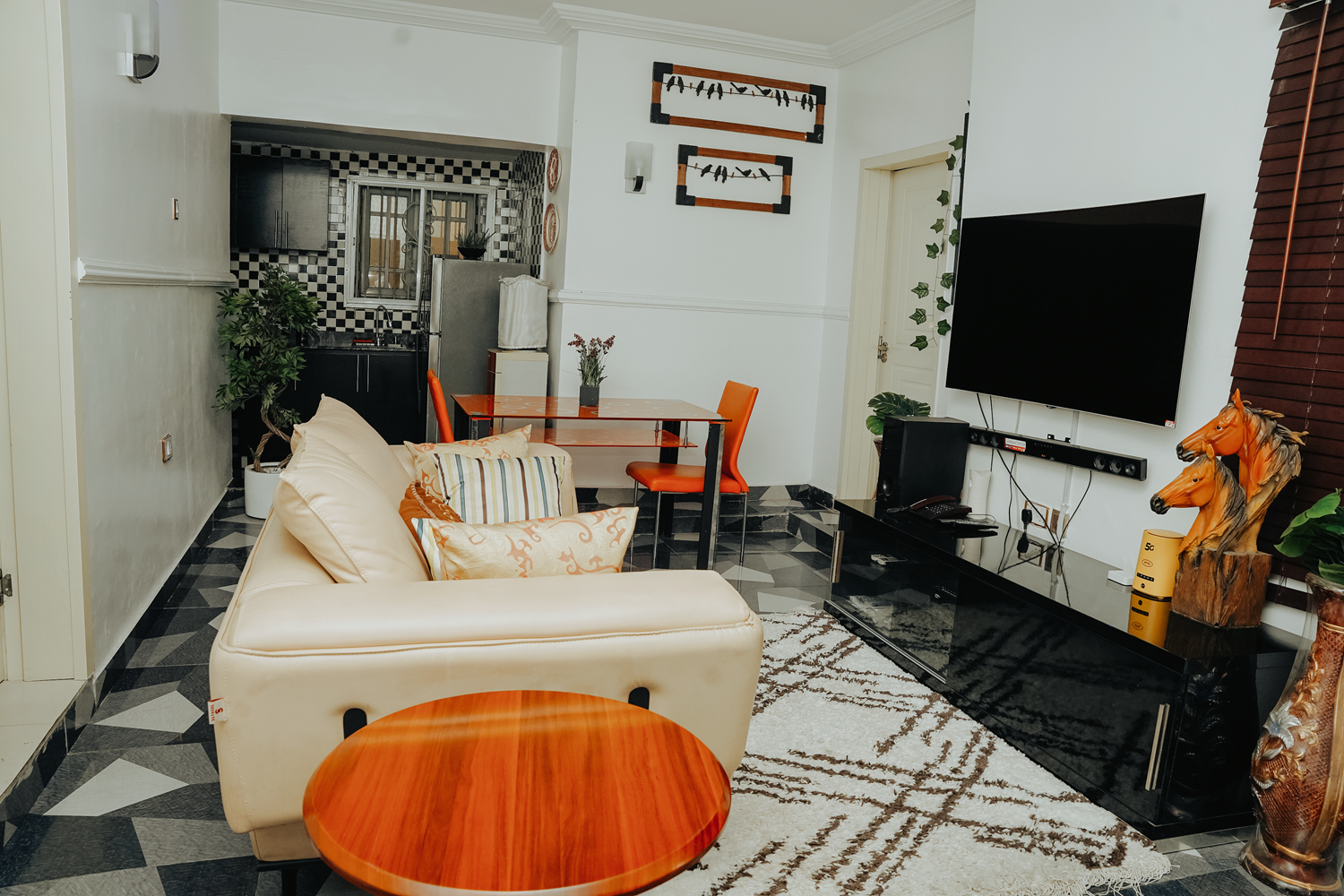 Apartment lounge with dining and kitchenette